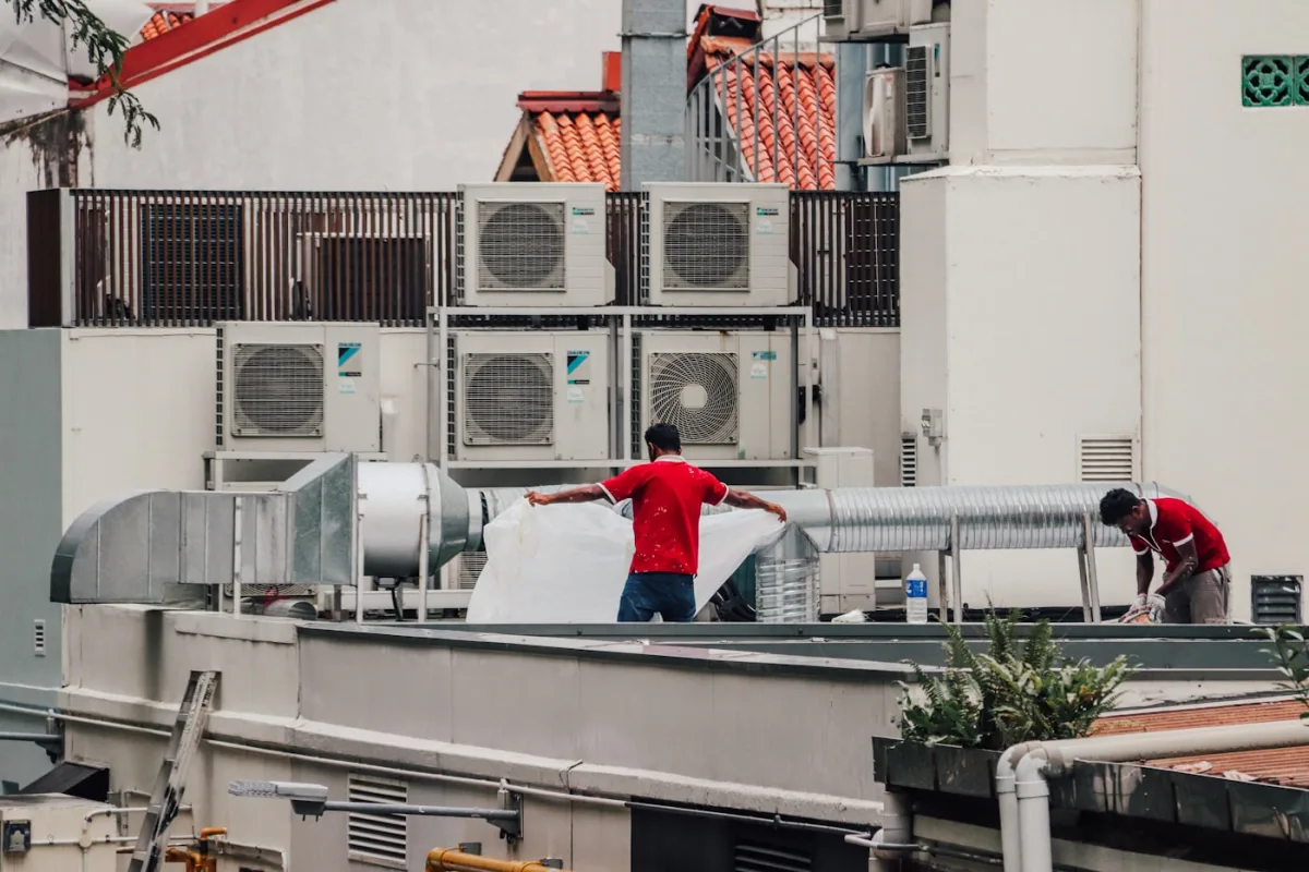 Rooftop AC units being serviced